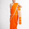 Orange with silver zari pallu in silver zari border handwoven linen saree