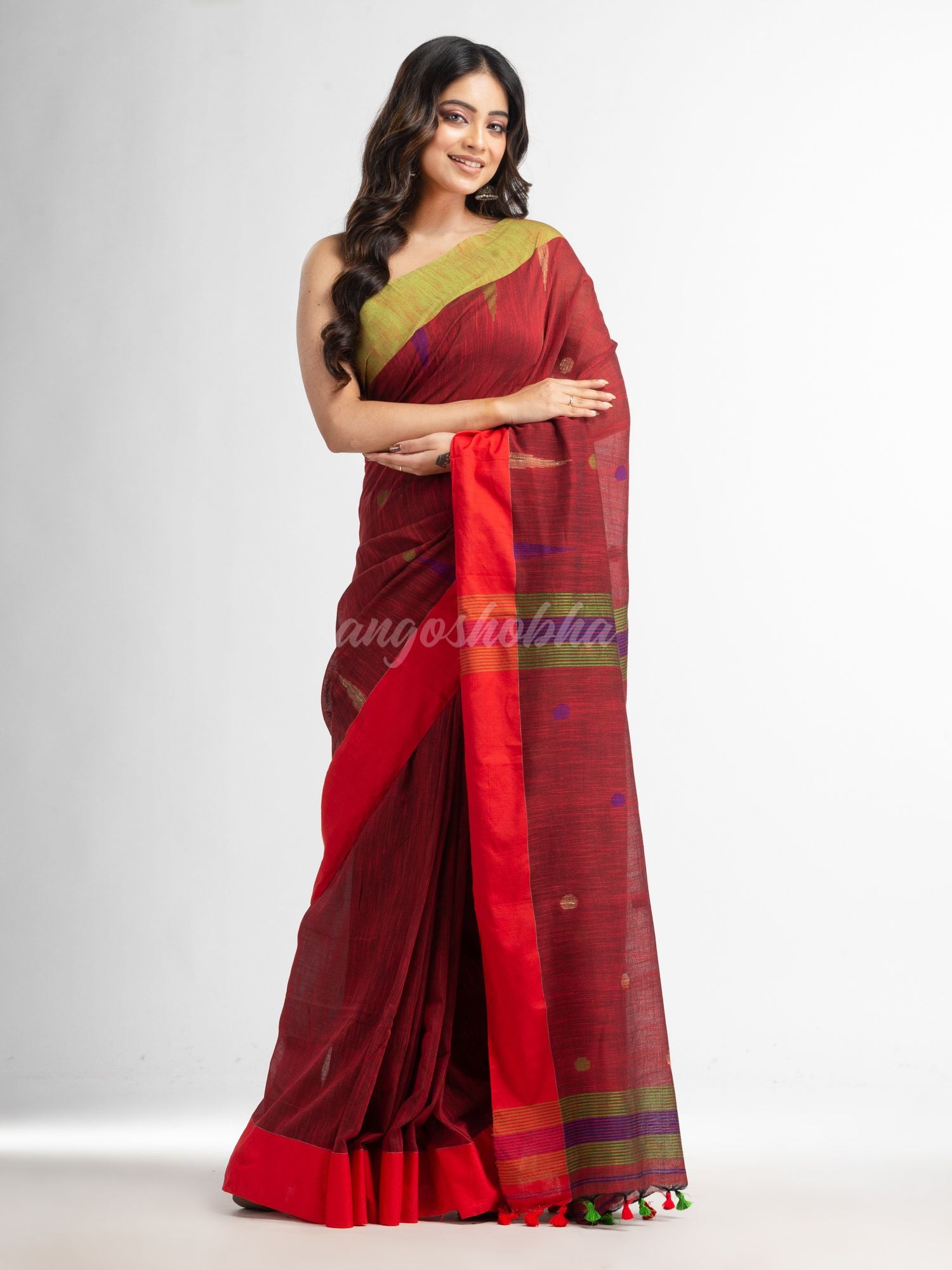 Rust all over ball Buti with Pallu in temple border handwoven saree