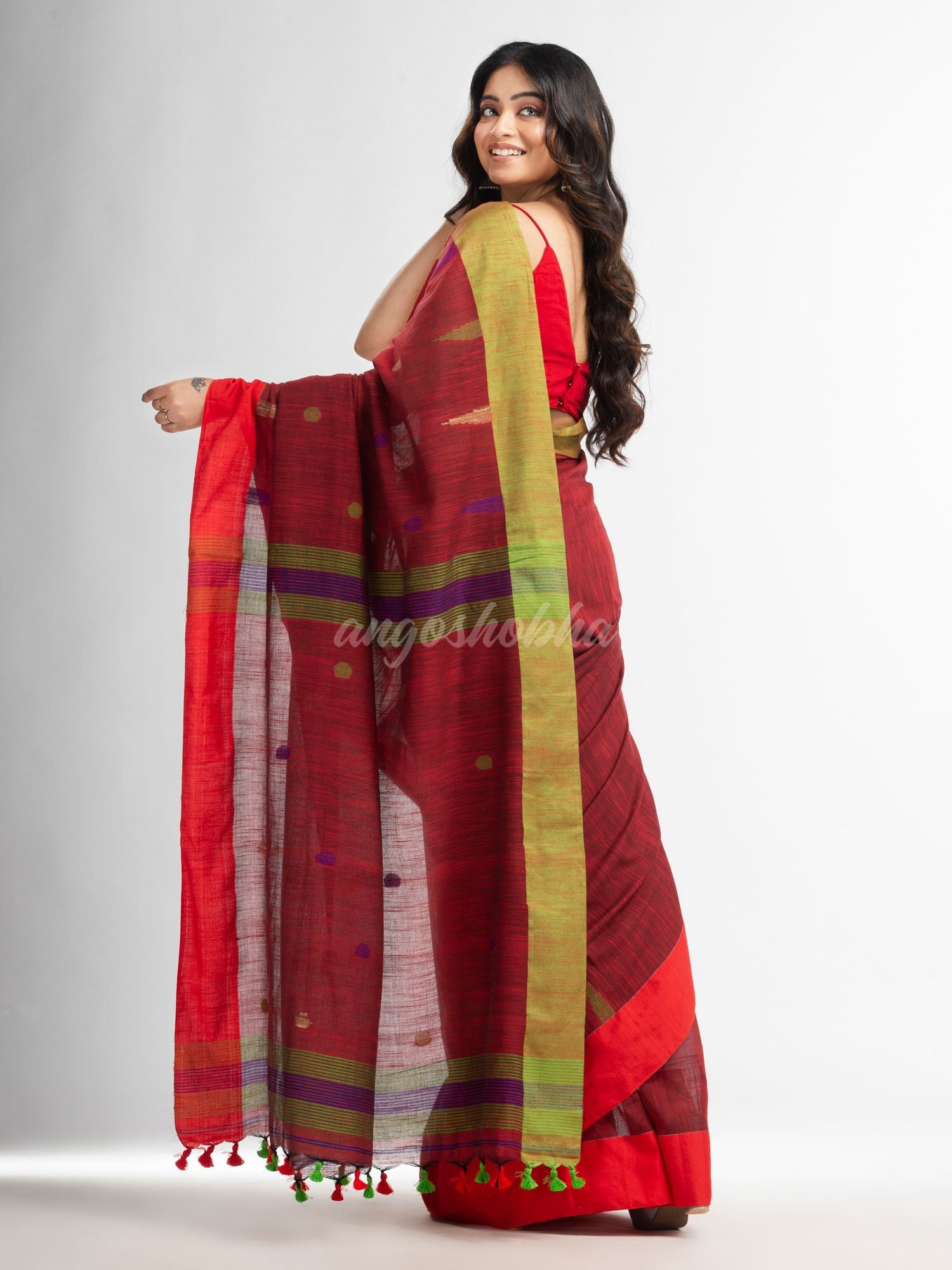 Rust all over ball Buti with Pallu in temple border handwoven saree