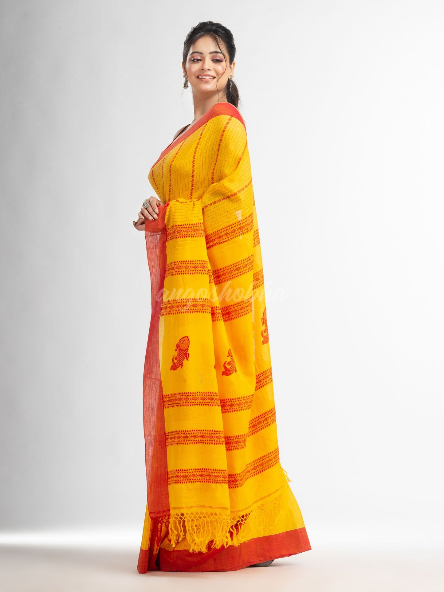 Yellow all  body small fish design with fish design pallu in solid border handwoven cotton saree