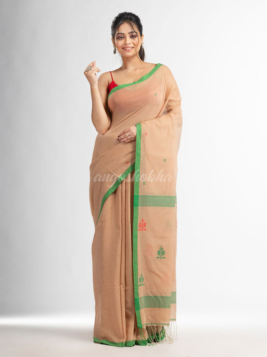 Biscuit all body buti with buti in green border handwoven cotton saree