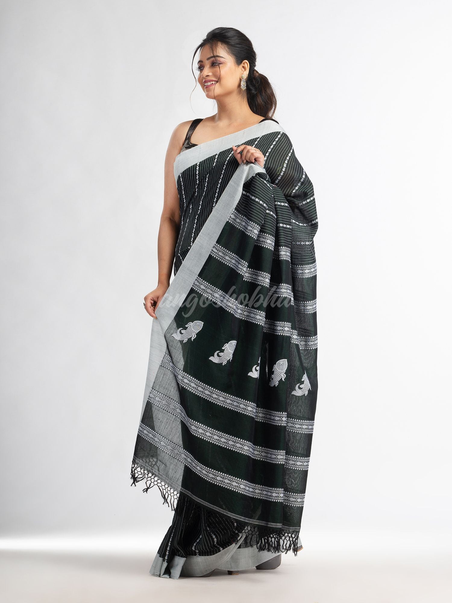 Bottle green all  body small fish design with fish design pallu in solid border handwoven cotton saree
