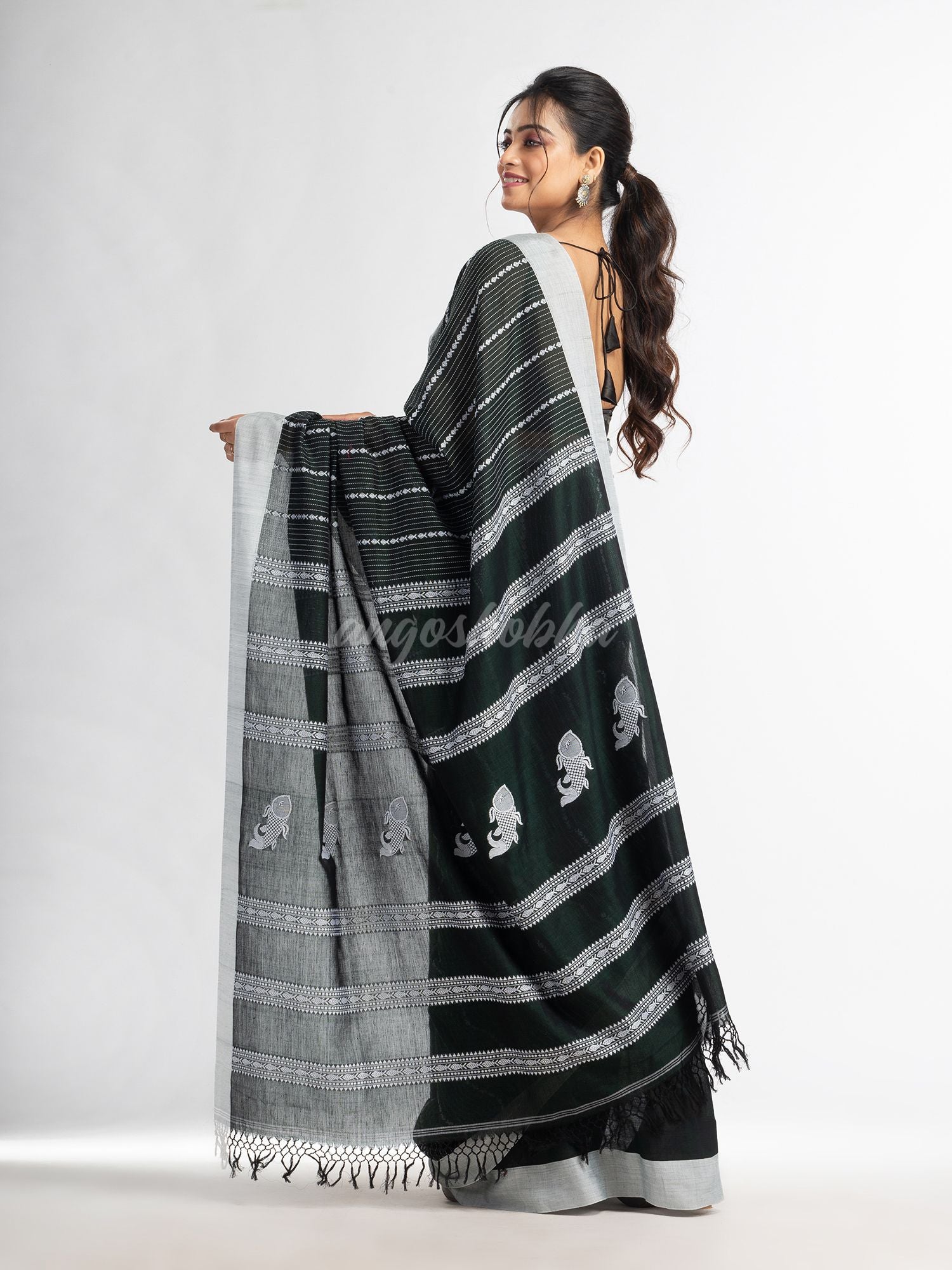 Bottle green all  body small fish design with fish design pallu in solid border handwoven cotton saree