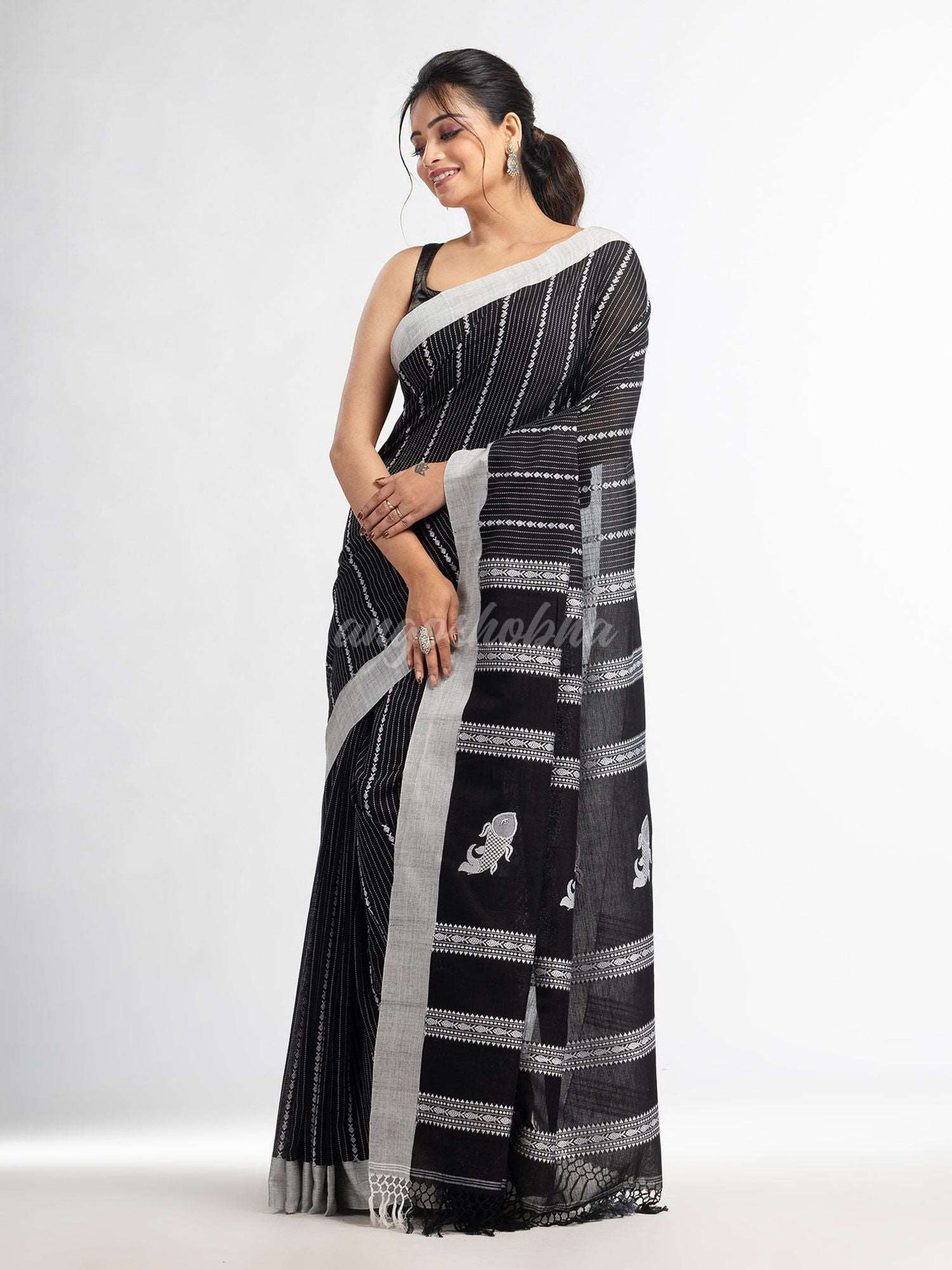 Black all  body small fish design with fish design pallu in solid border handwoven cotton saree