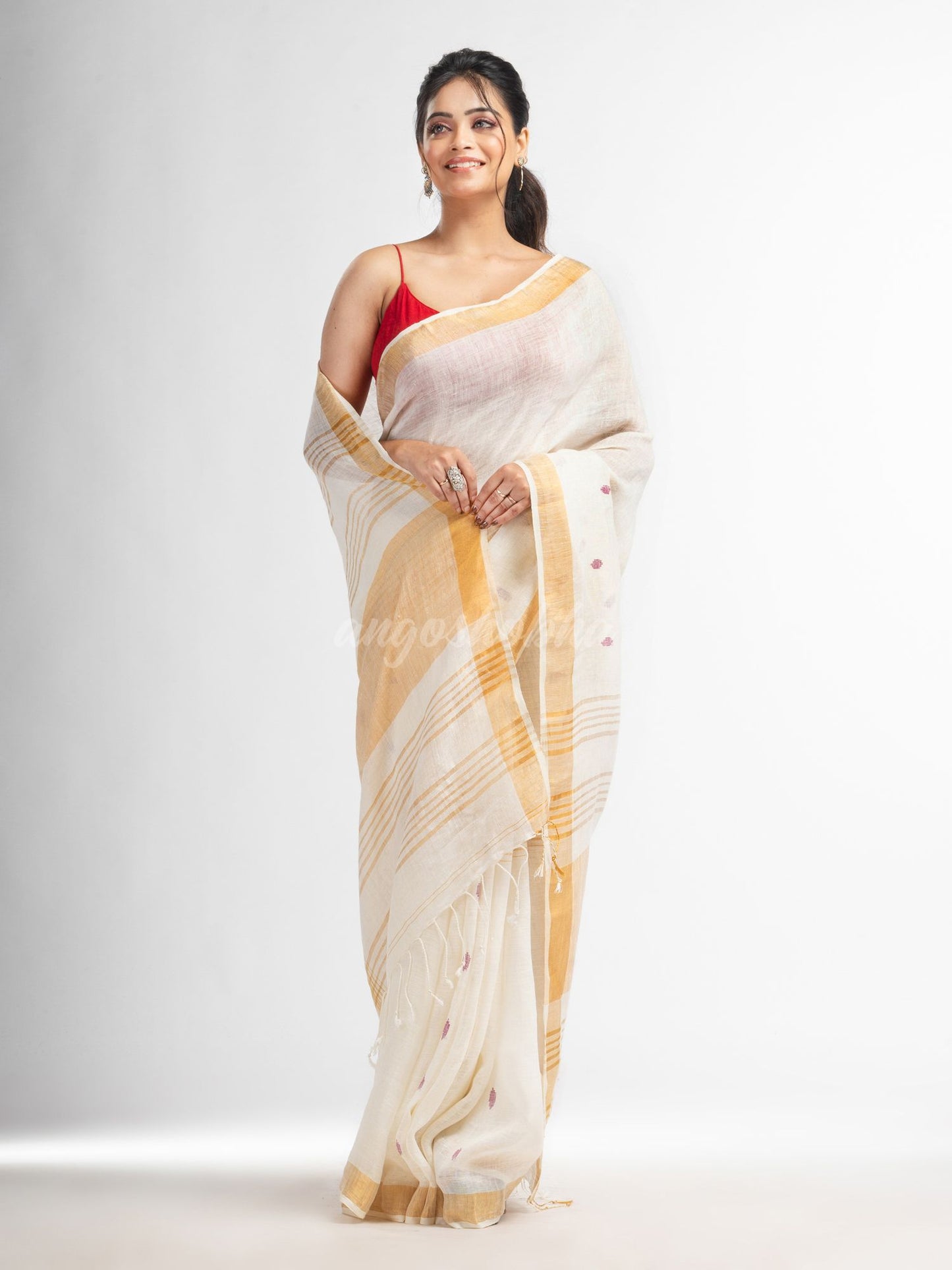 white half body buti with gold zari pallu in gold zari border handwoven linen saree