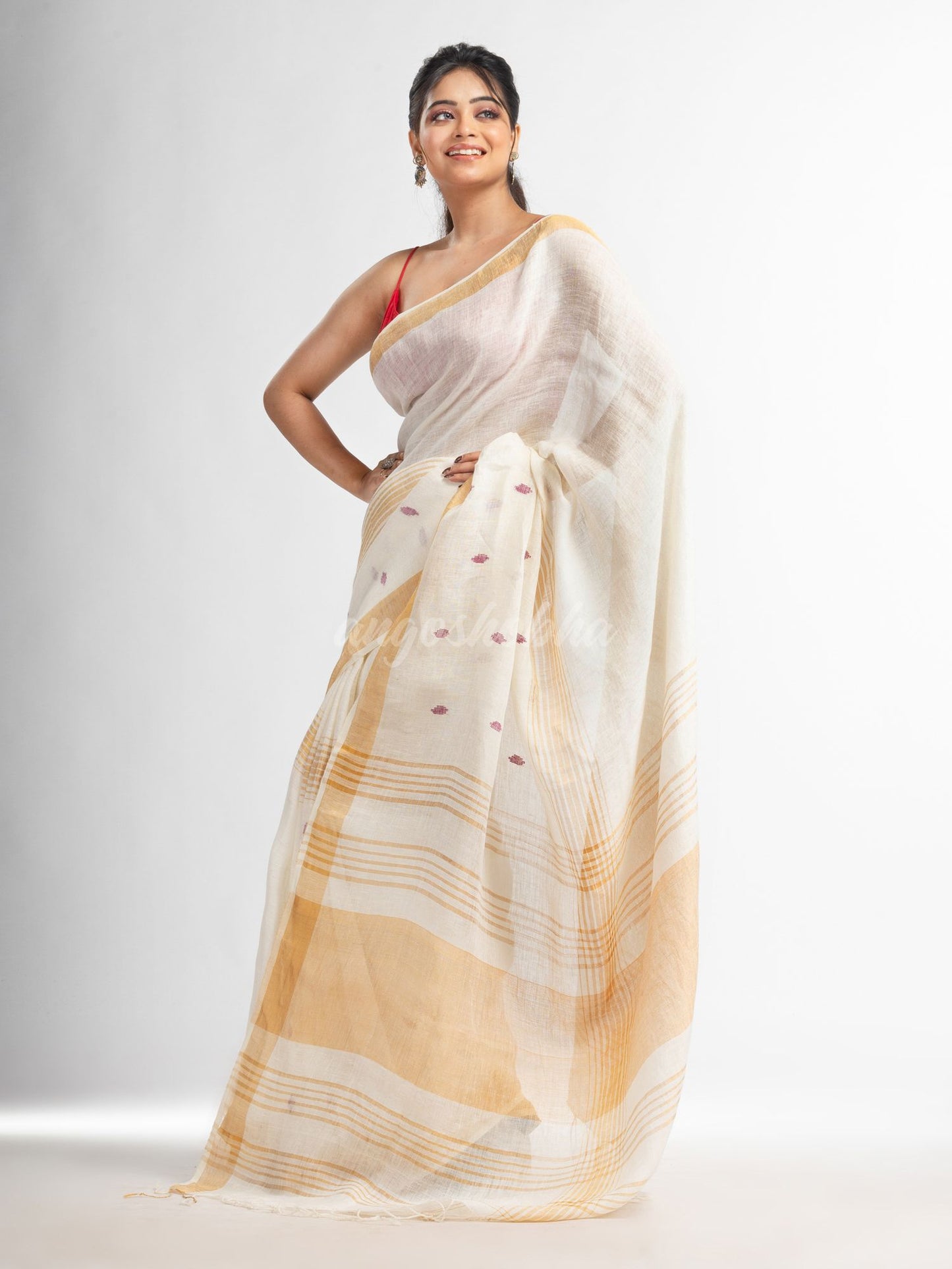 white half body buti with gold zari pallu in gold zari border handwoven linen saree