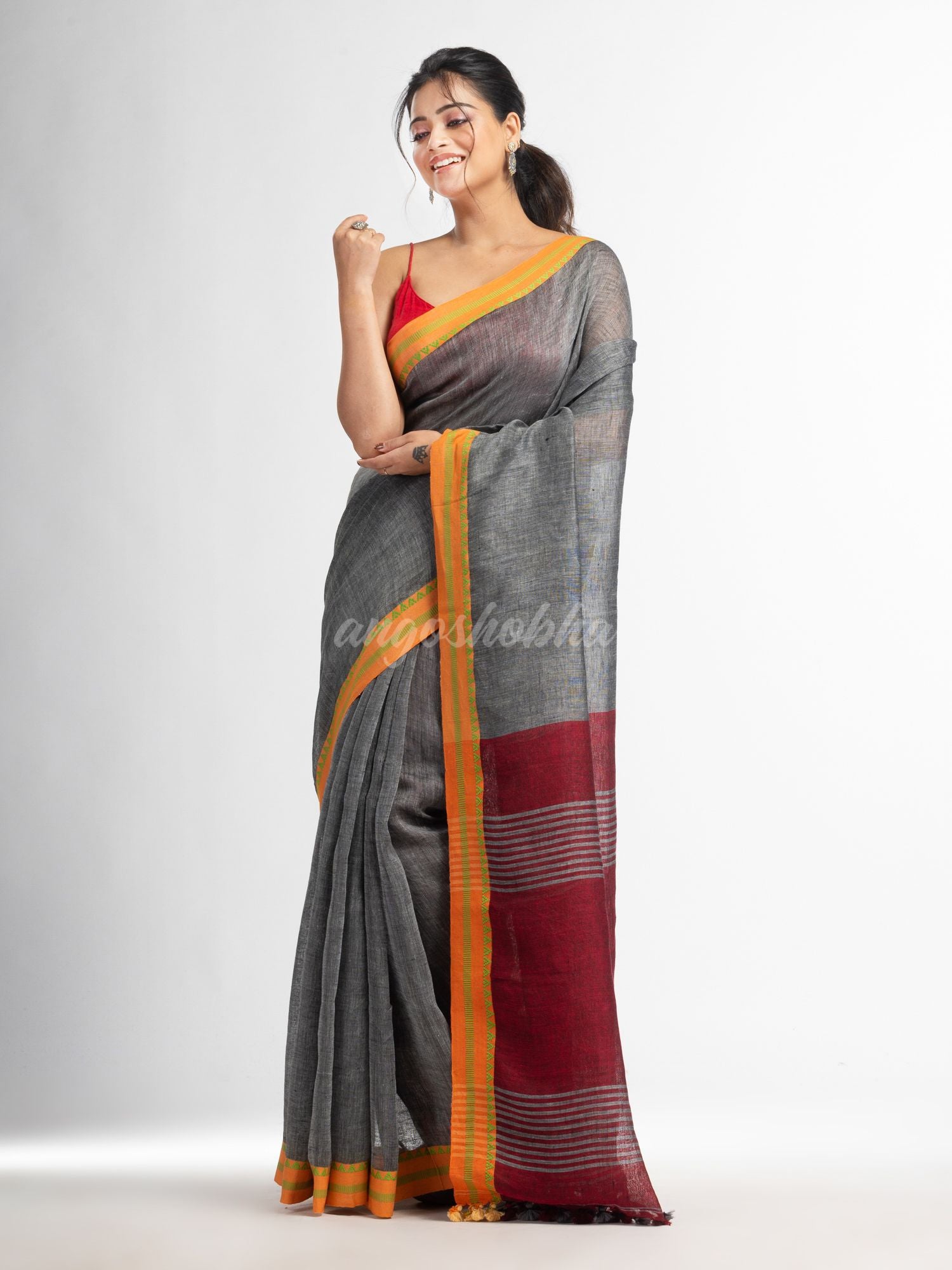 Grey with red pallu in jacquard boeder handwoven linen saree