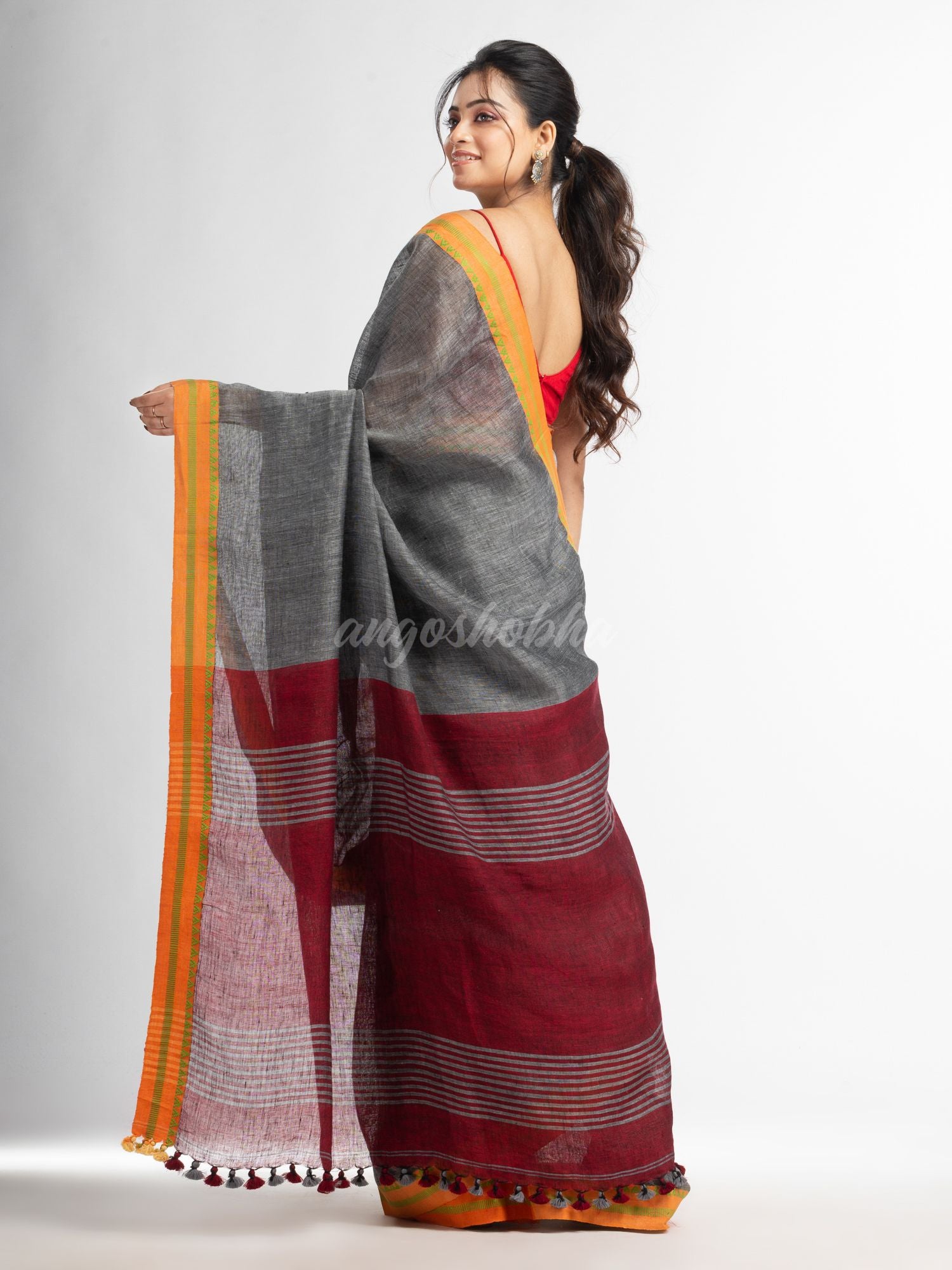 Grey with red pallu in jacquard boeder handwoven linen saree