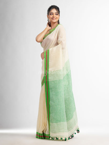 Cream with green pallu in multi colour boeder handwoven linen saree