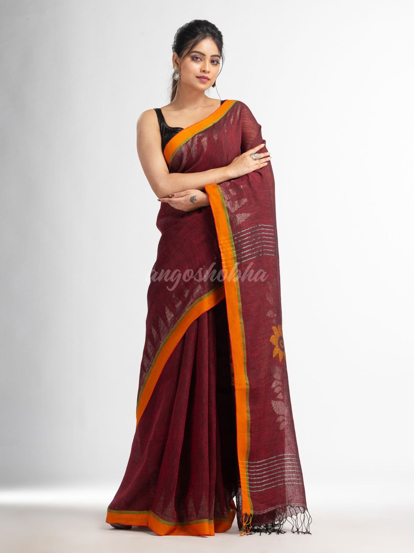 Maroon with jamdani pallu in temple border handwoven linen saree