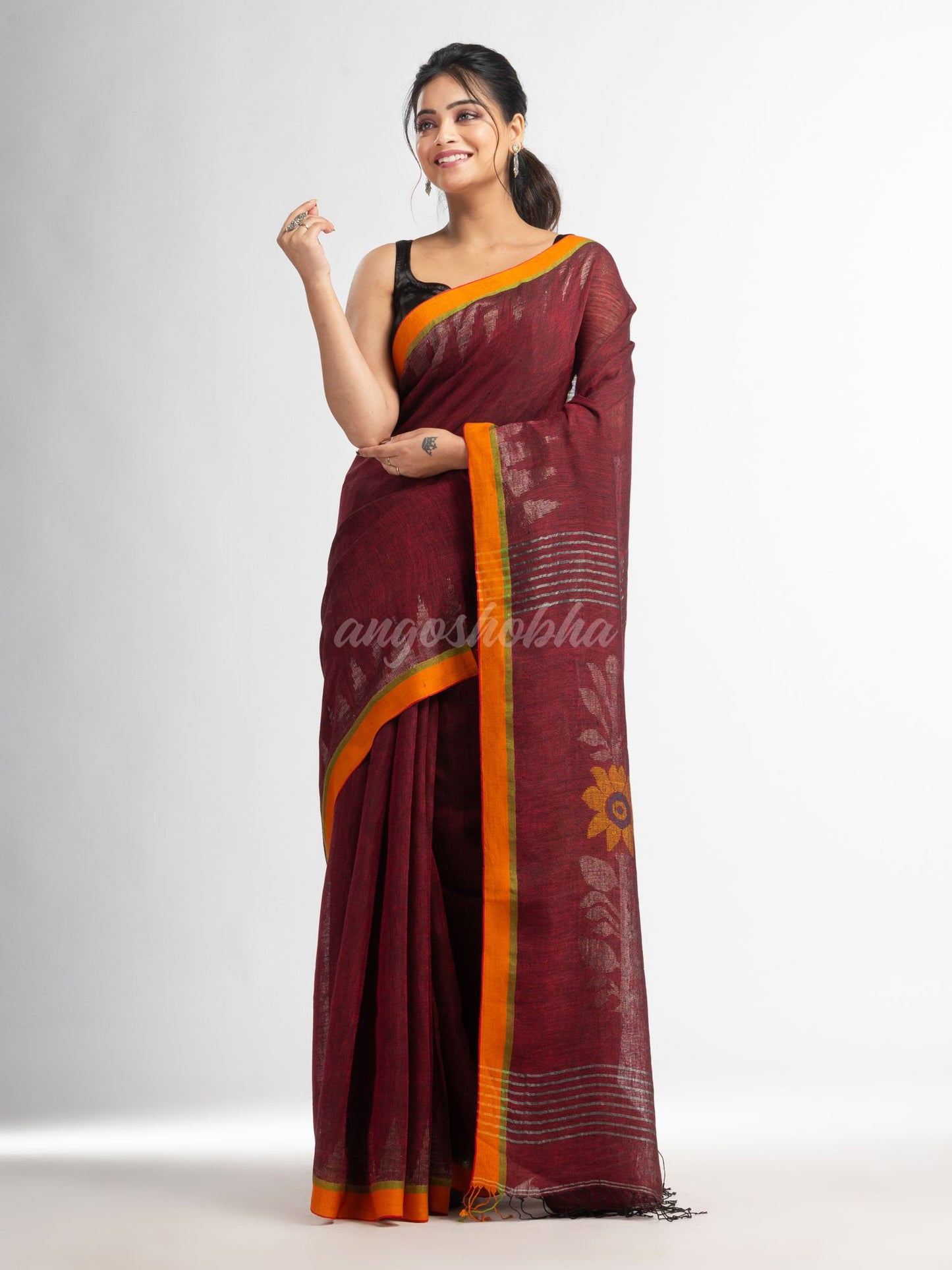 Maroon with jamdani pallu in temple border handwoven linen saree