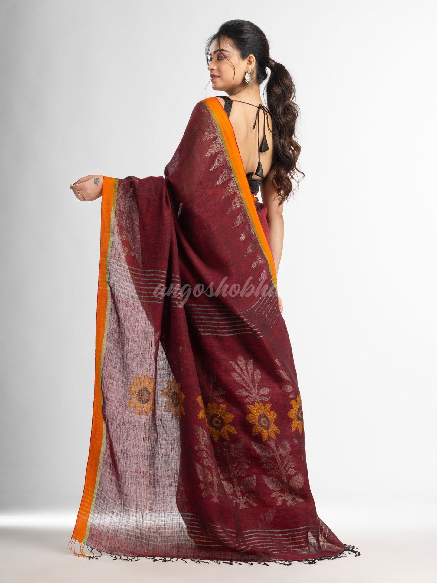 Maroon with jamdani pallu in temple border handwoven linen saree