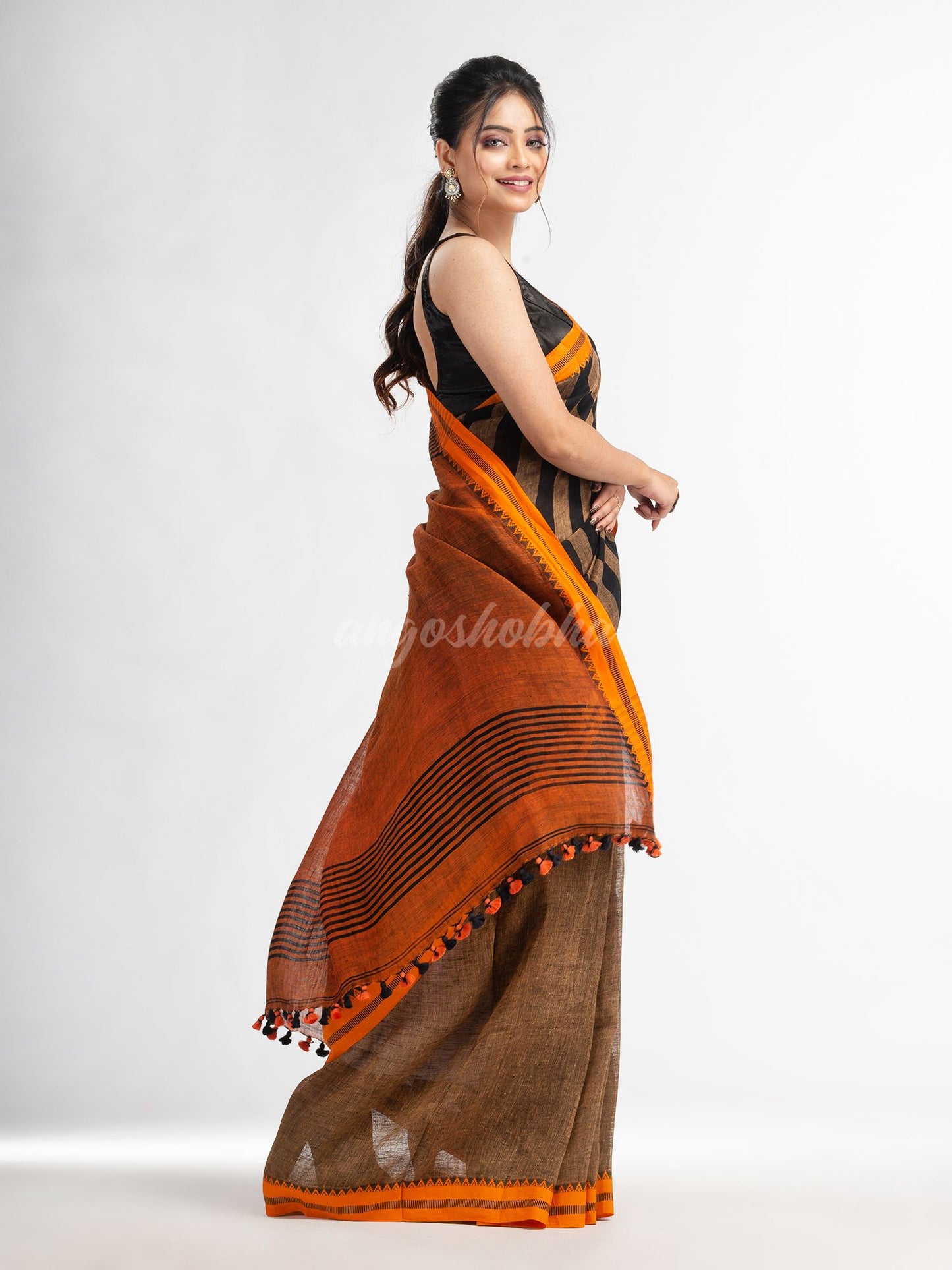 Sunset Brown all body stipe with rust pallu in jacquard boeder handwoven linen saree