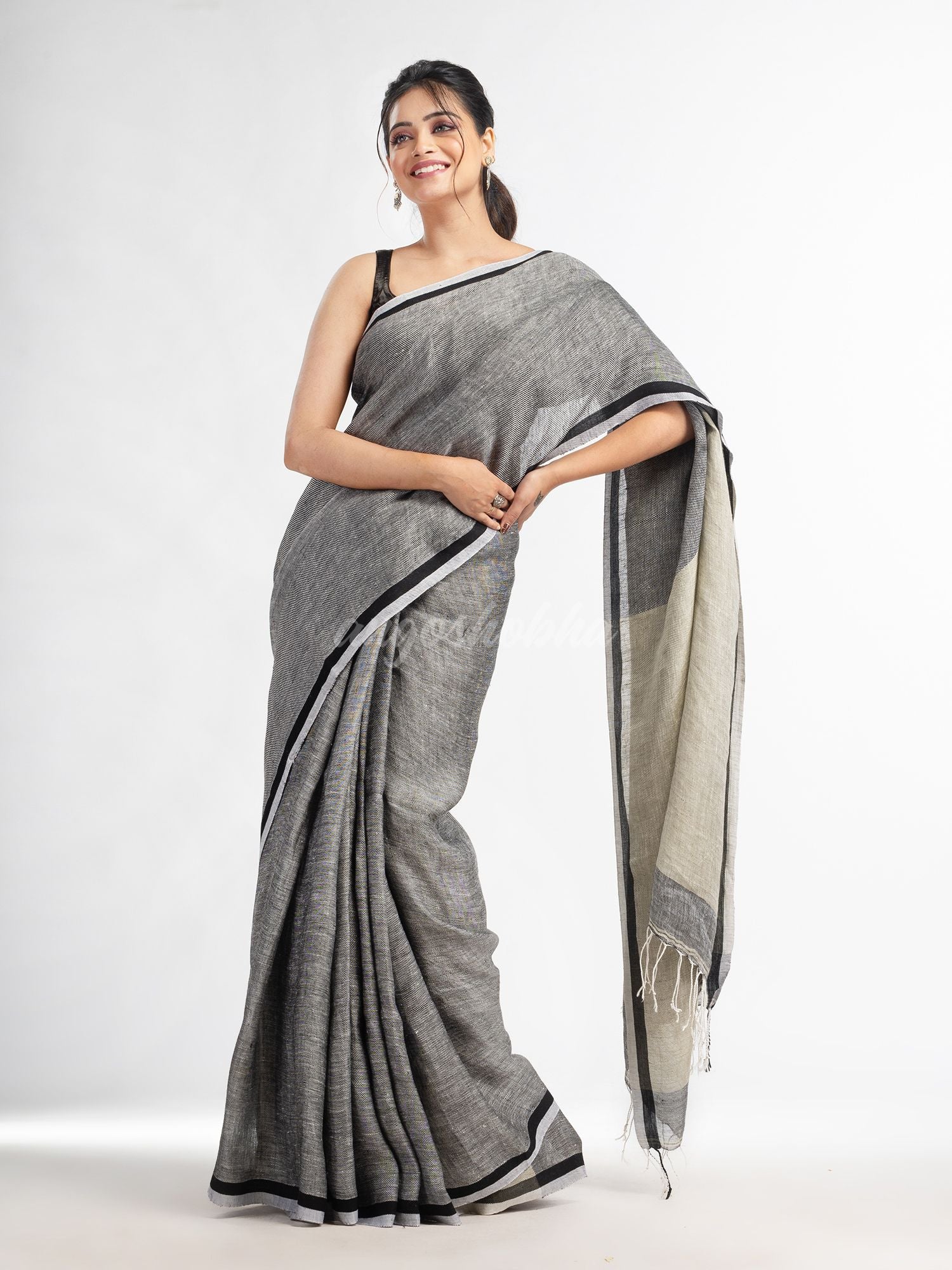 Grey twill weaving with sage green pallu in white and black border handwoven linen saree