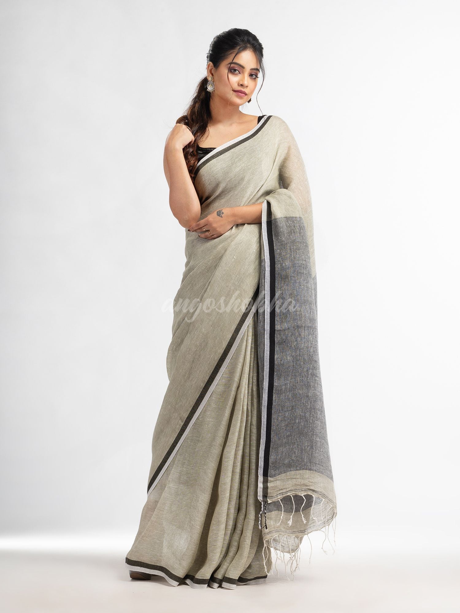 Sage green twill weaving with black pallu in white and black border handwoven linen saree
