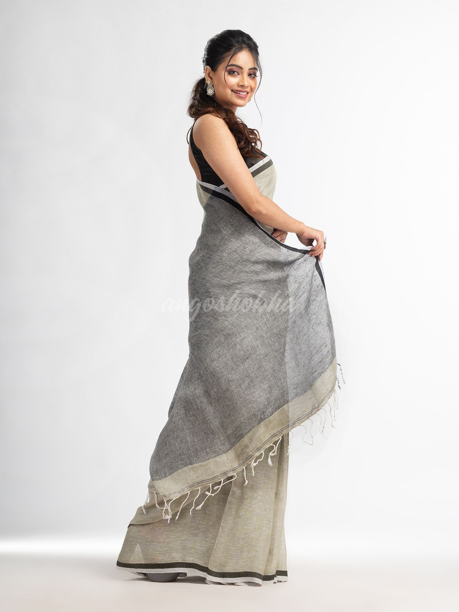 Sage green twill weaving with black pallu in white and black border handwoven linen saree