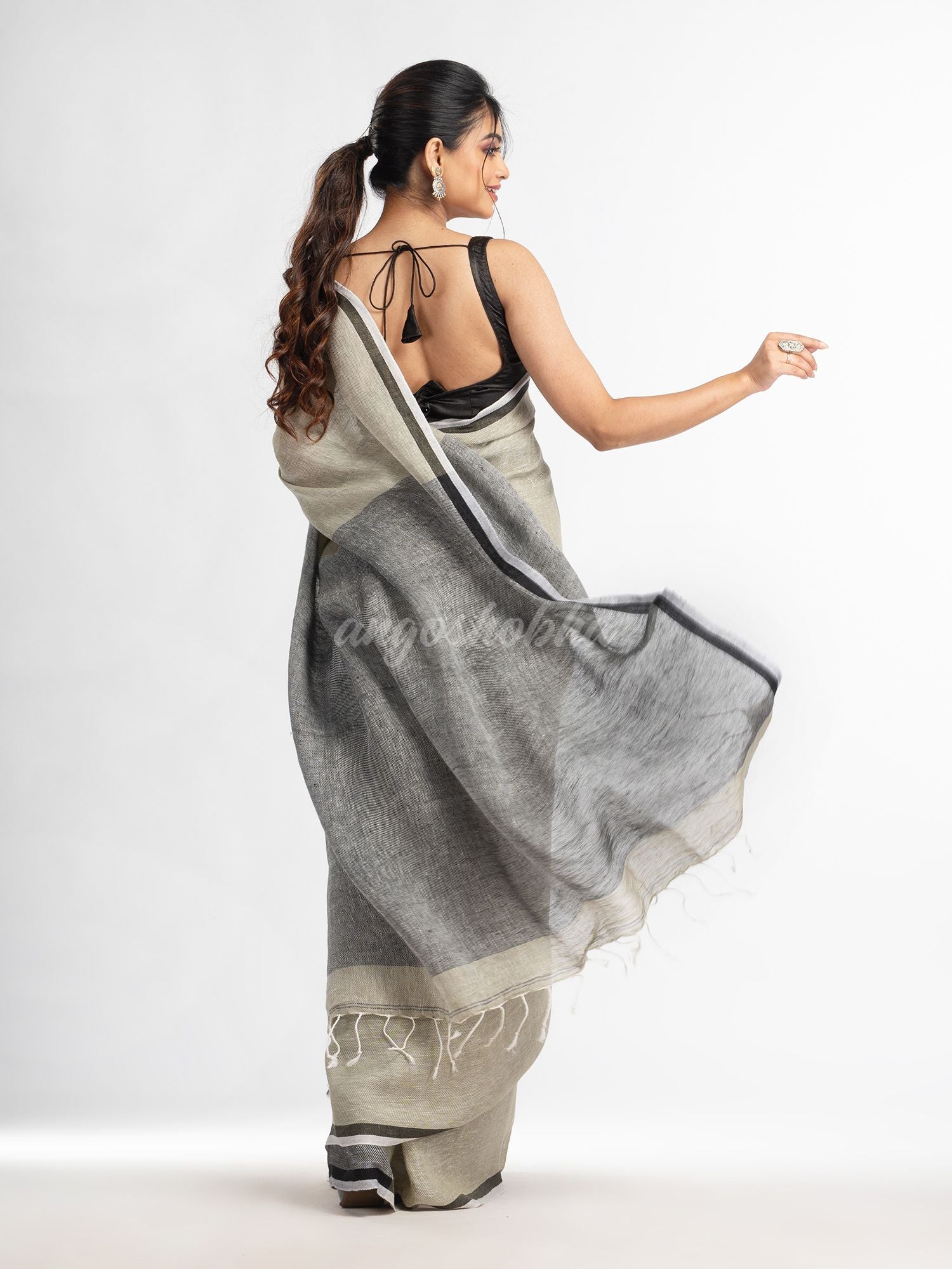 Sage green twill weaving with black pallu in white and black border handwoven linen saree