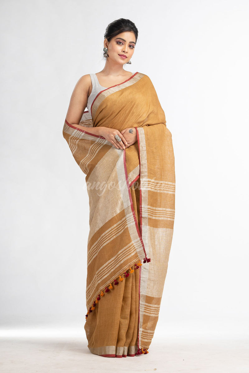 saffron with silver zari pallu in silver zari border handwoven linen saree
