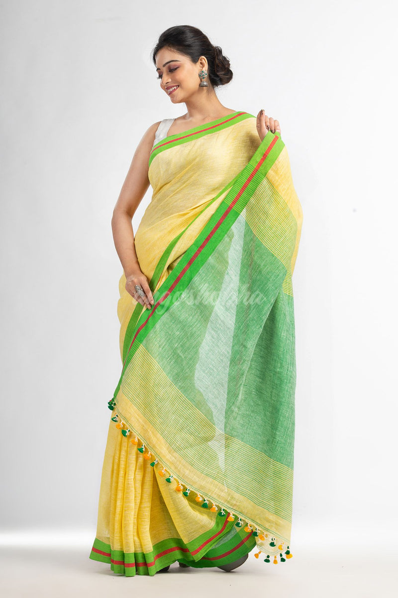 Yellow with green pallu in multi colour broder handwoven linen saree