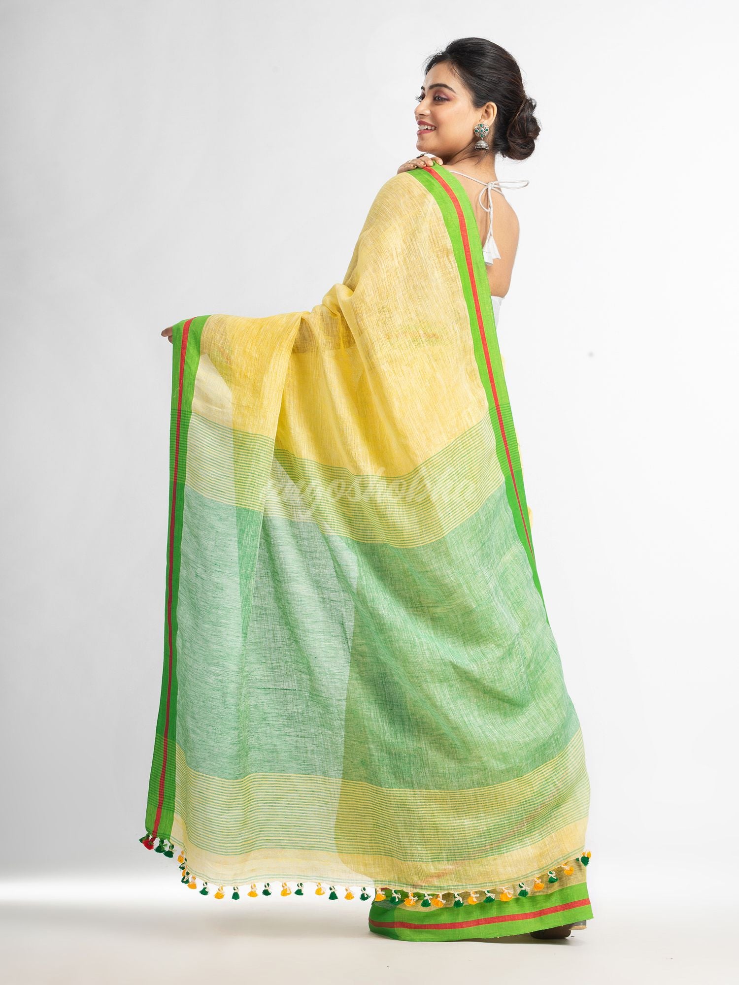 Yellow with green pallu in multi colour broder handwoven linen saree