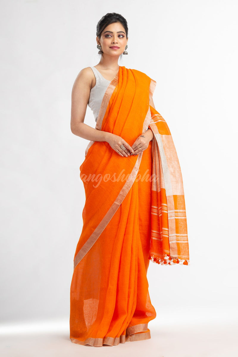 Orange with silver zari pallu in silver zari border handwoven linen saree