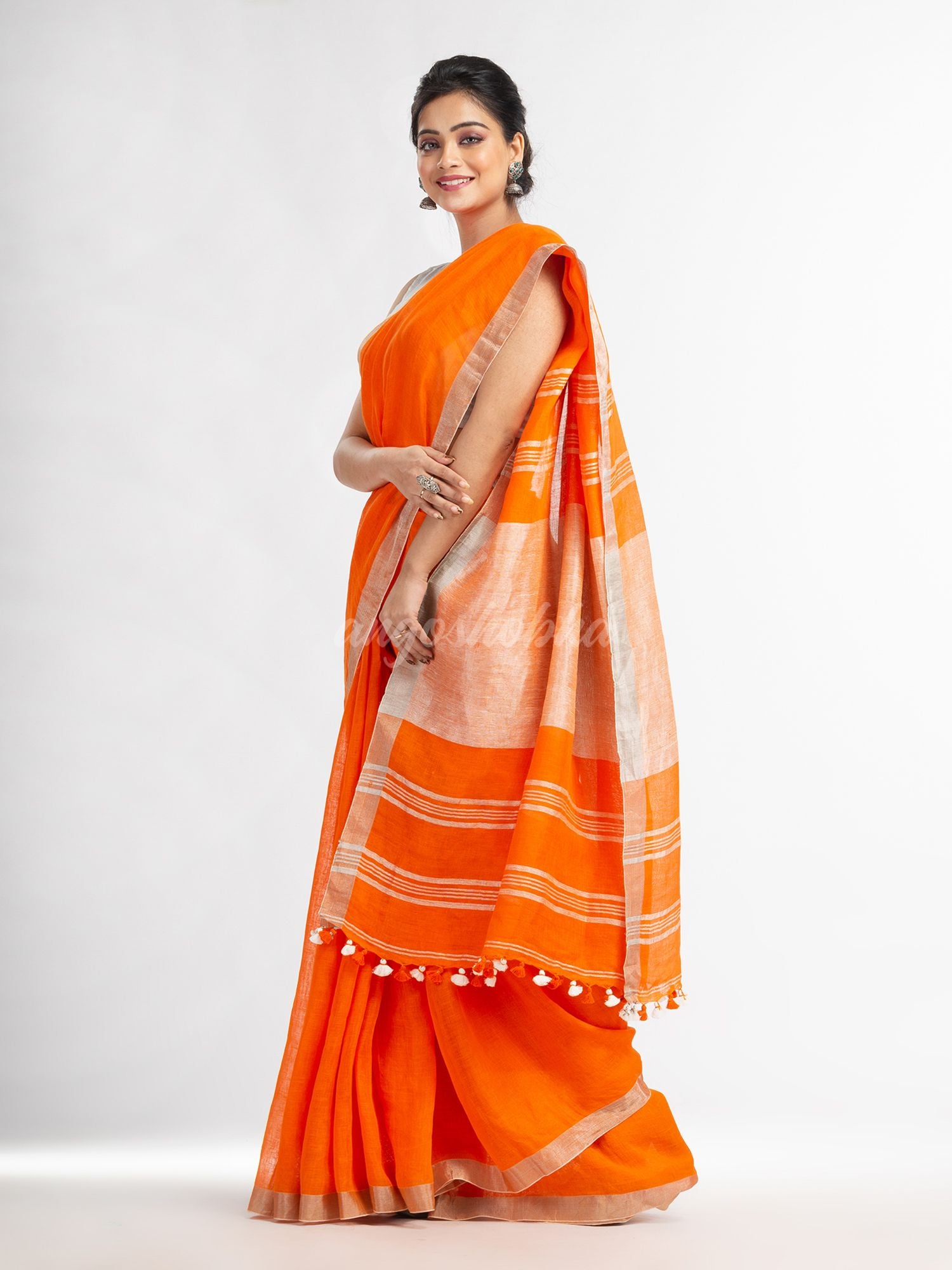 Orange with silver zari pallu in silver zari border handwoven linen saree