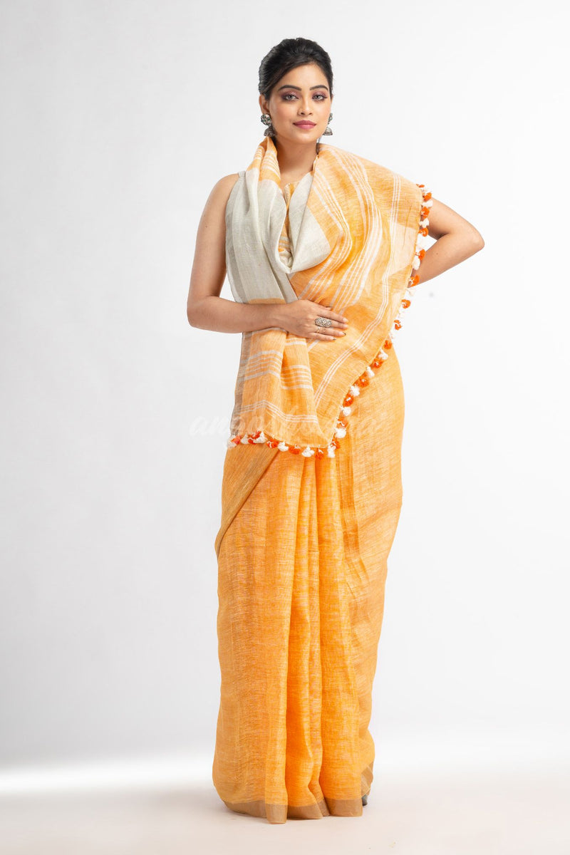 Orange with silver zari pallu in silver zari border handwoven linen saree