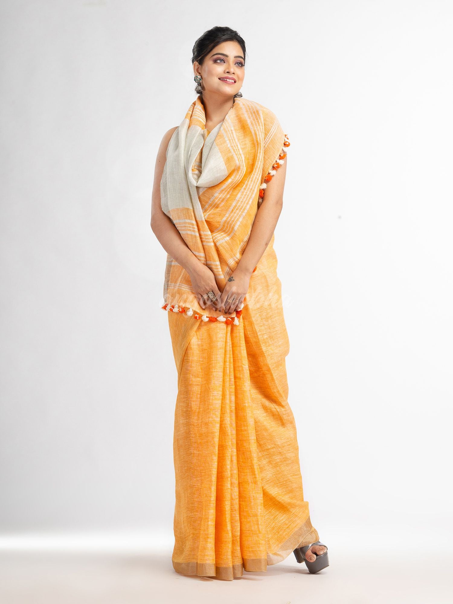 Orange with silver zari pallu in silver zari border handwoven linen saree