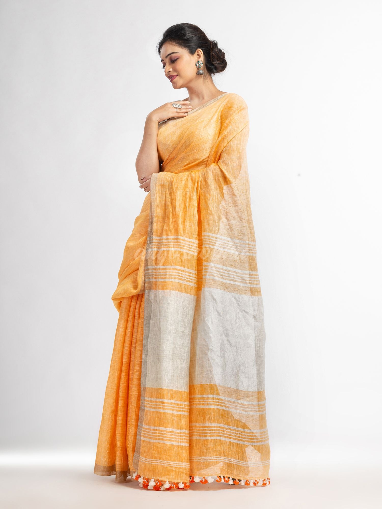 Orange with silver zari pallu in silver zari border handwoven linen saree