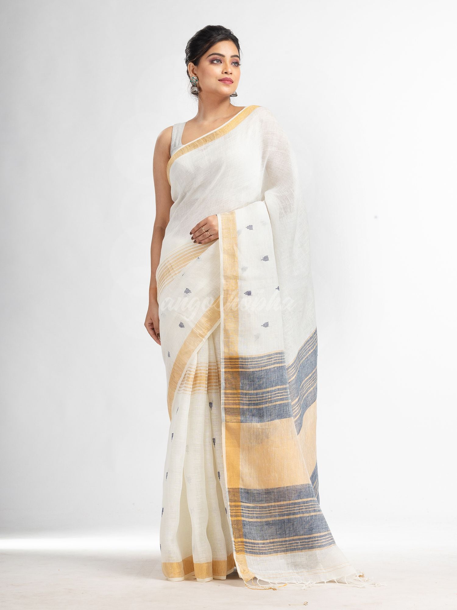 white half body buti with gold zari and navy blue pallu in gold zari border handwoven linen saree