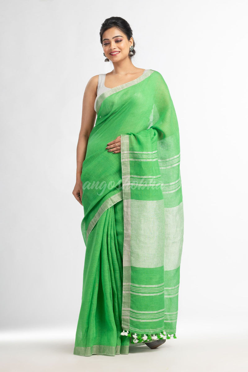 Green with silver zari pallu in silver zari border handwoven linen saree