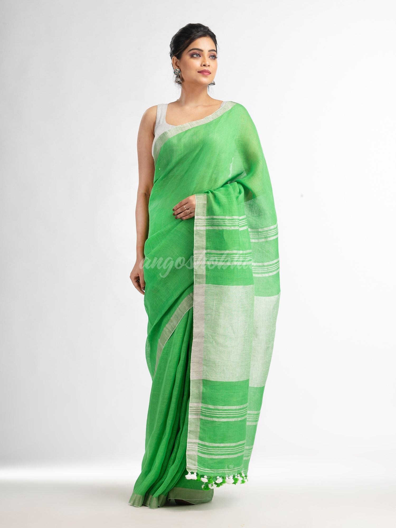 Green with silver zari pallu in silver zari border handwoven linen saree