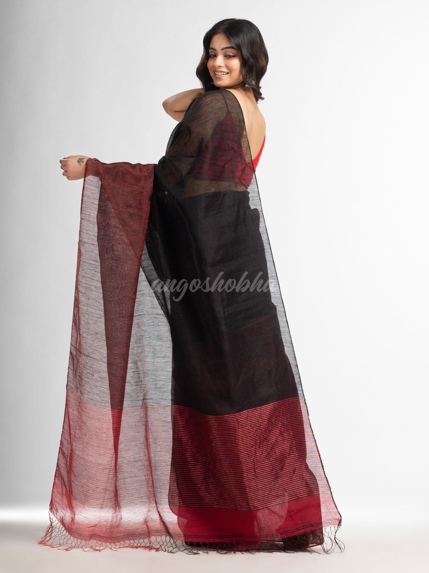 Black tissue linen multi colour pallu handwoven saree