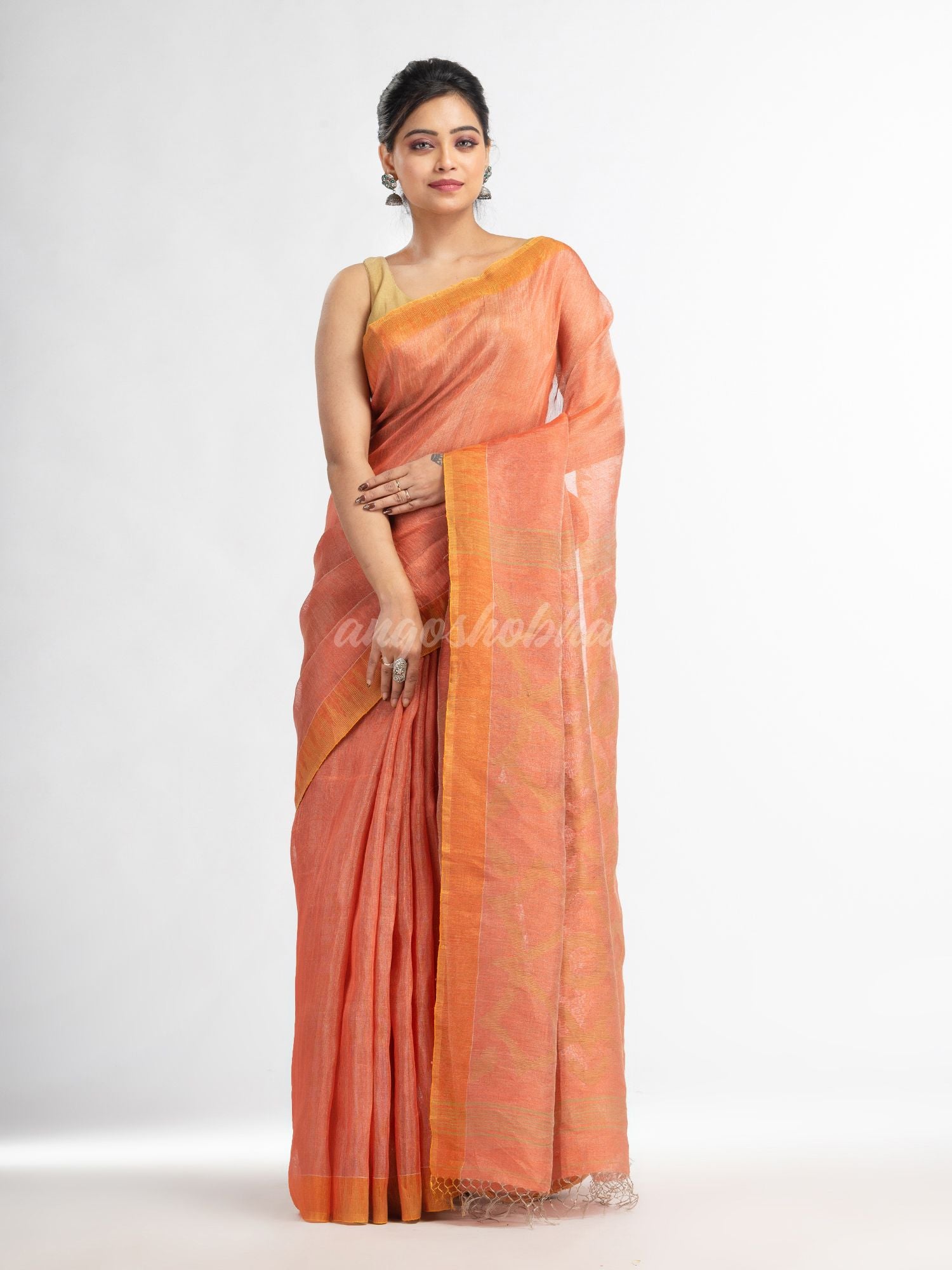 Peach linen tissue pallu jamdani temple border handwoven saree