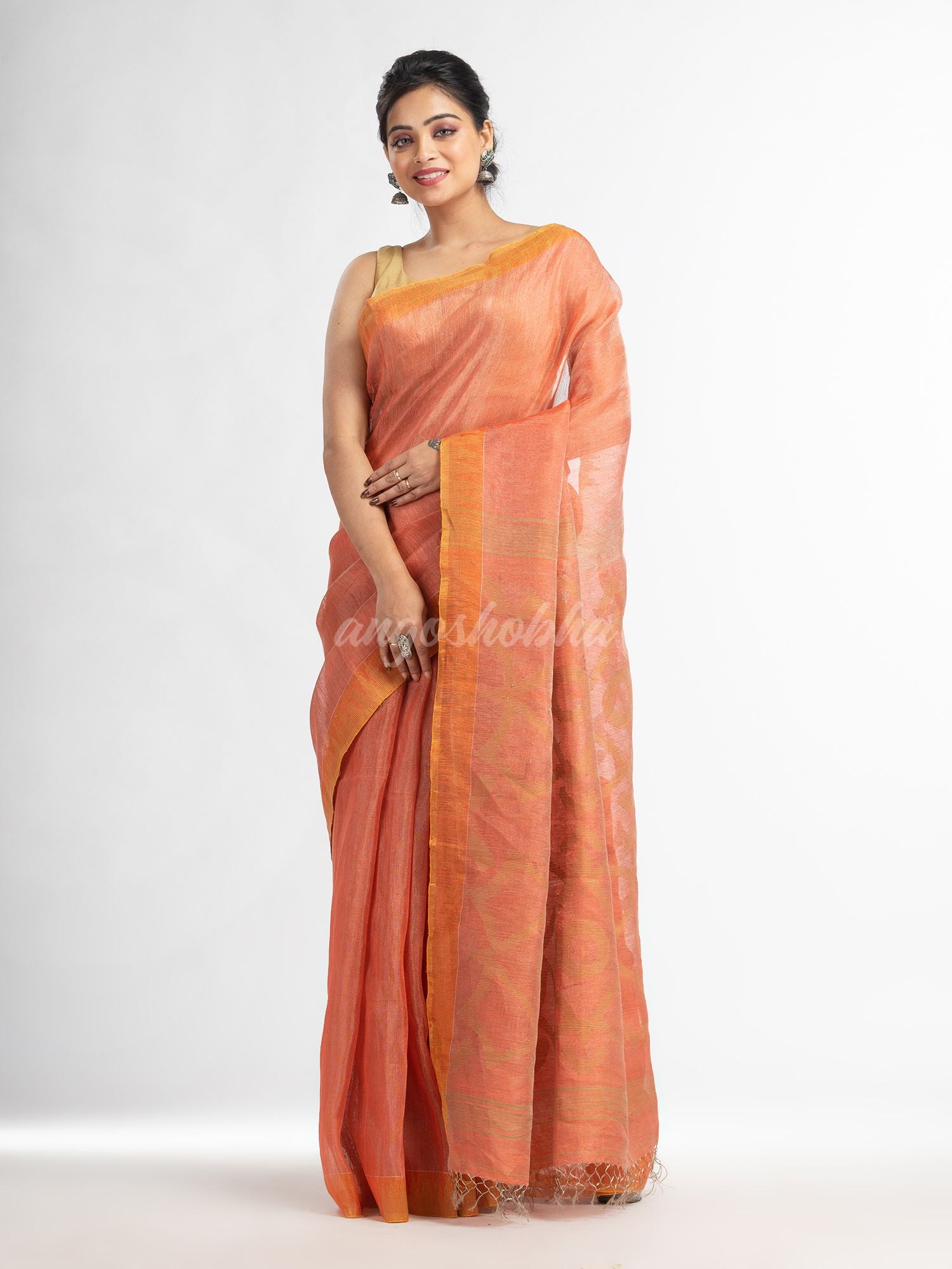 Peach linen tissue pallu jamdani temple border handwoven saree