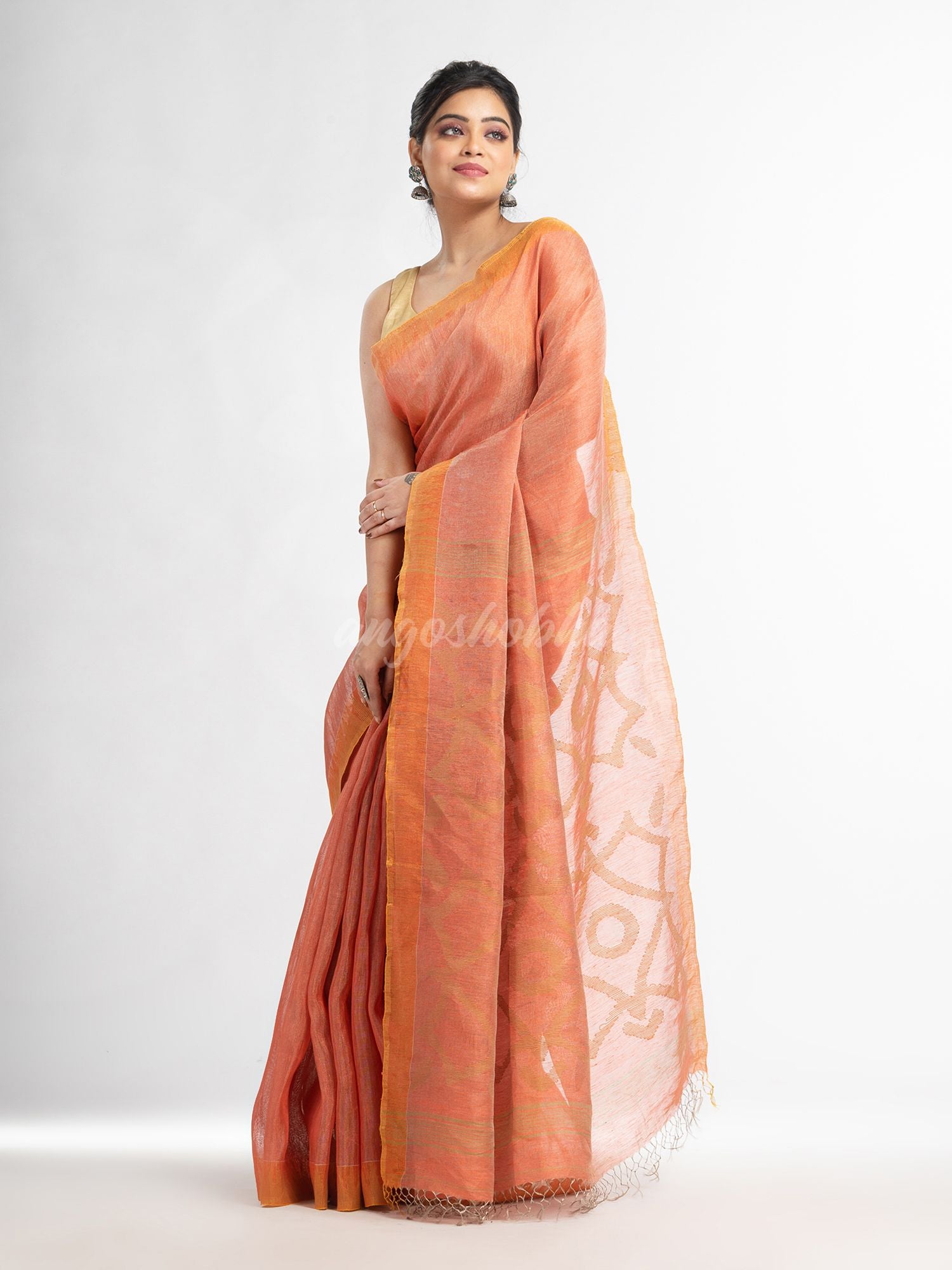 Peach linen tissue pallu jamdani temple border handwoven saree