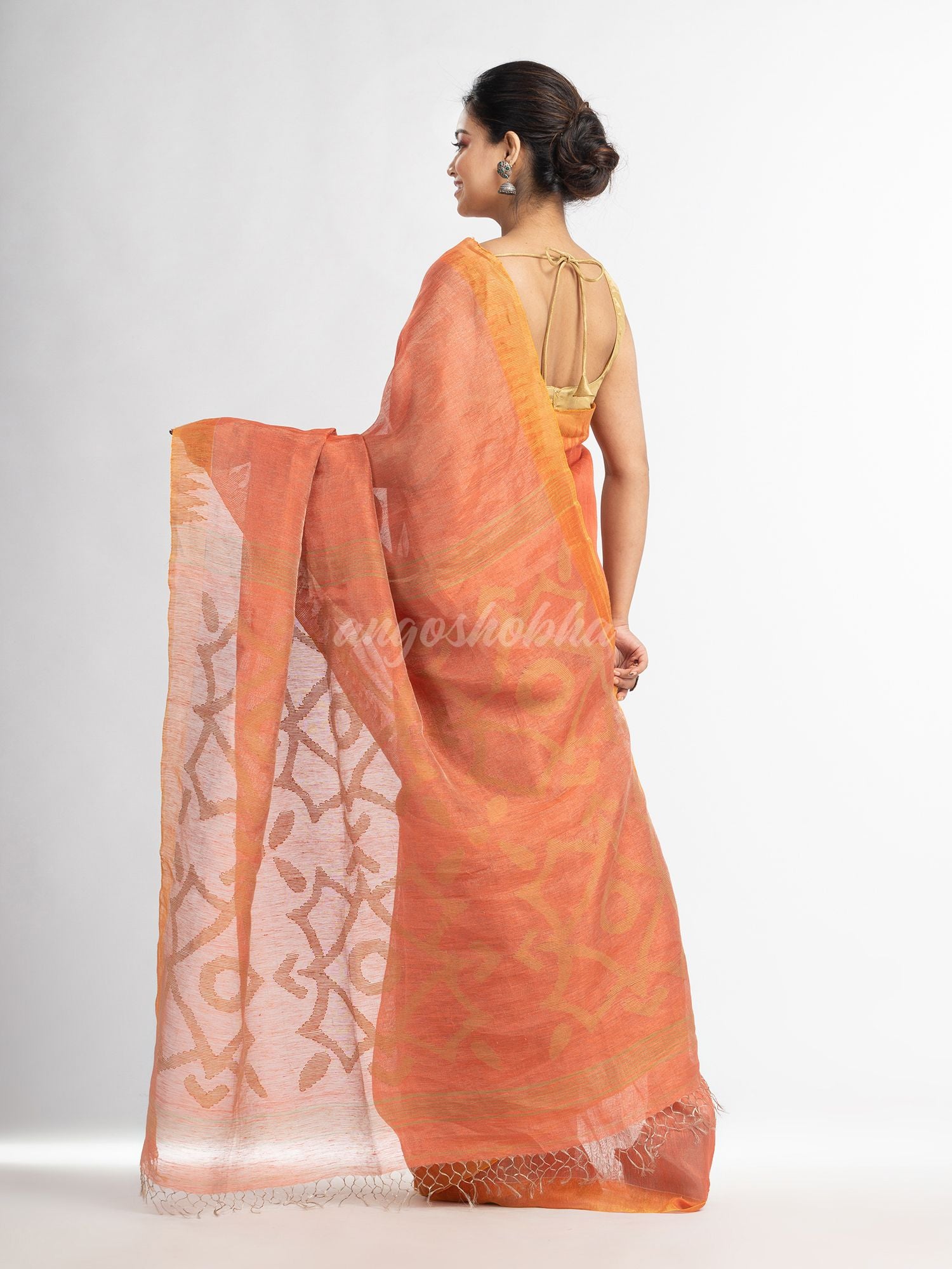 Peach linen tissue pallu jamdani temple border handwoven saree