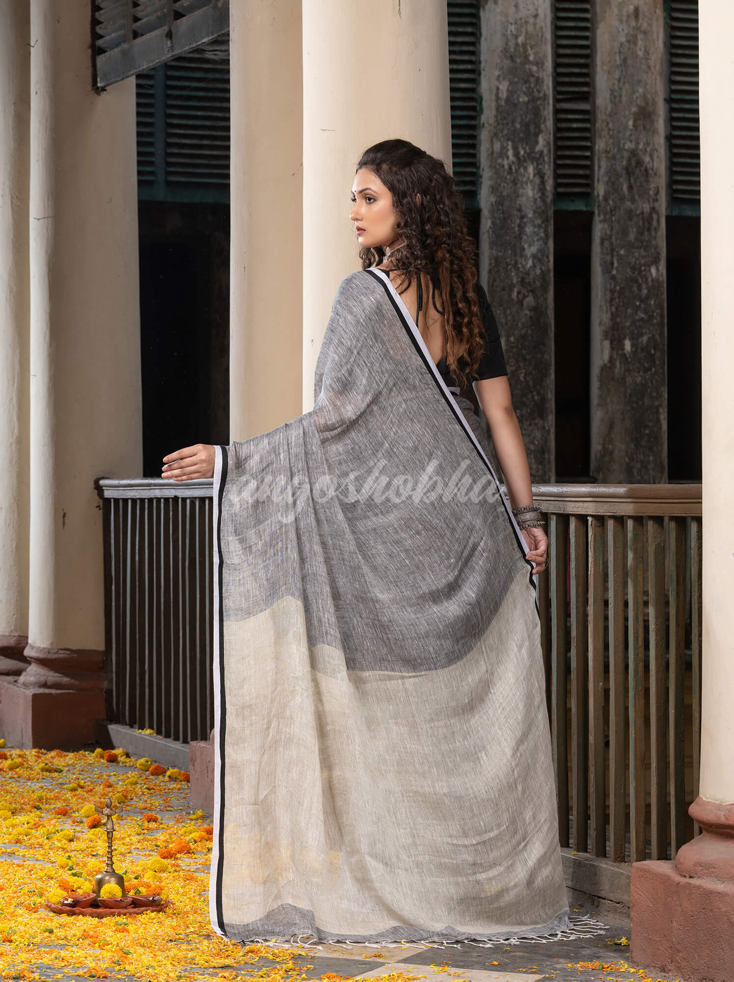 Grey twill weaving with sage green pallu in white and black border handwoven linen saree