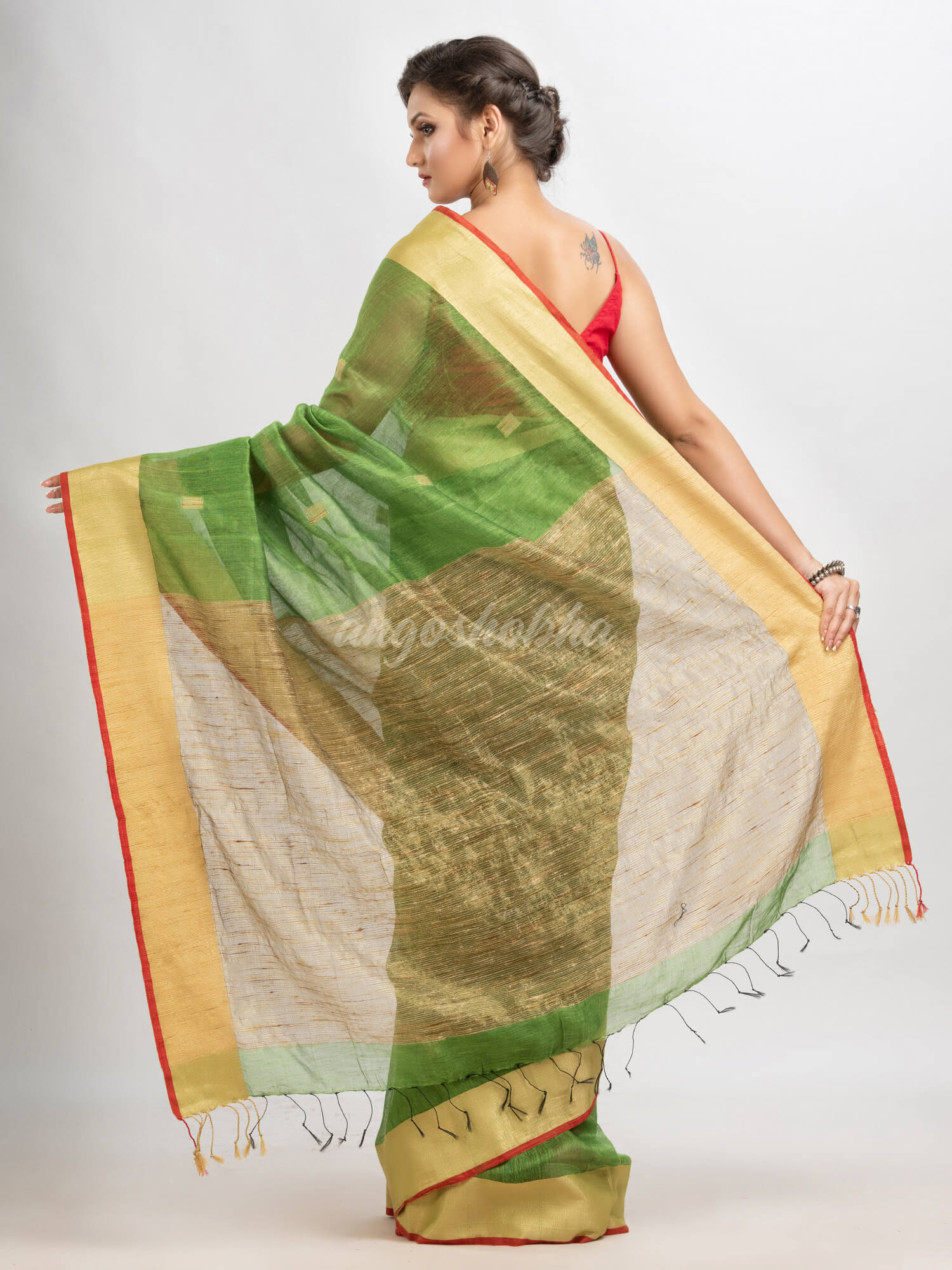Lime green silk blend linen with  solid border jamdani saree