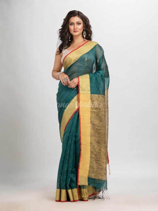 Dark teal silk blend linen with  solid border jamdani saree