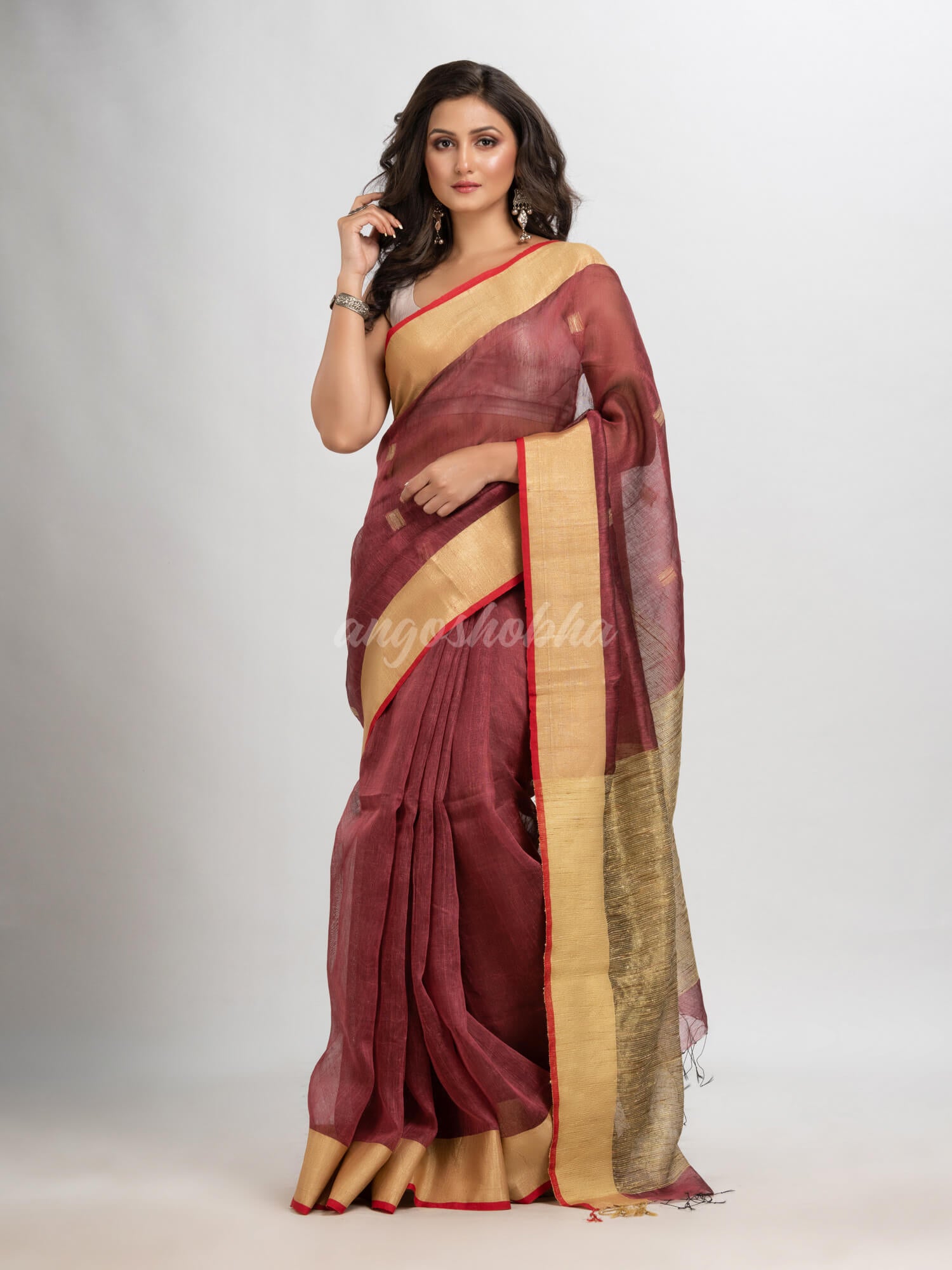 Umber brown silk blend linen with  solid border jamdani saree