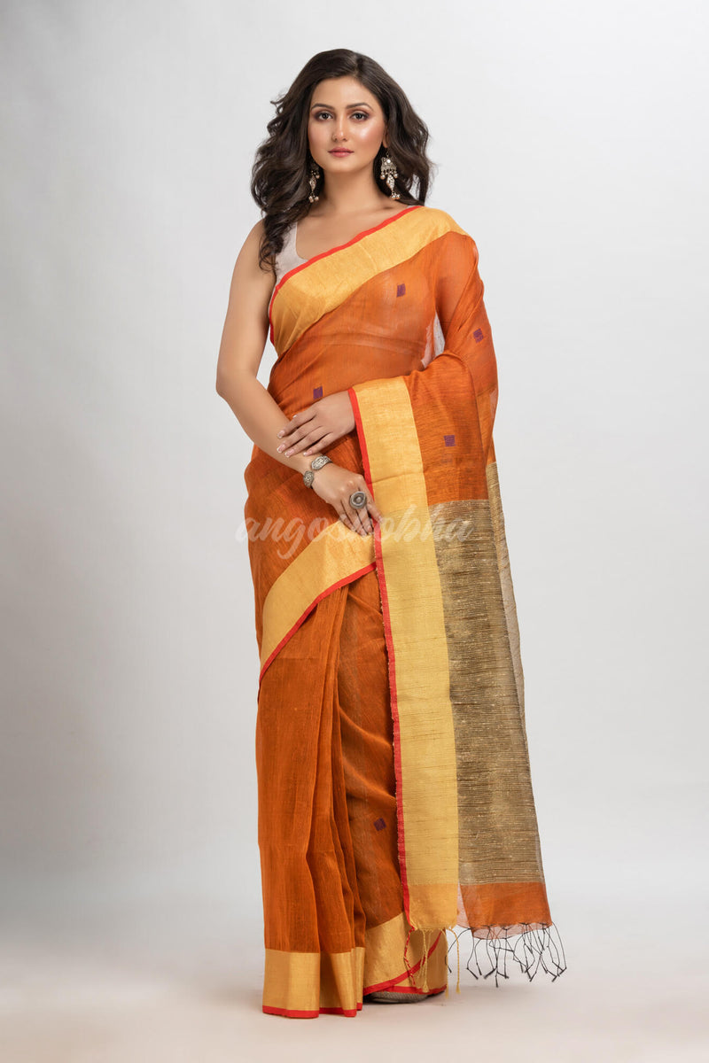 Russet silk blend linen with  solid border jamdani saree