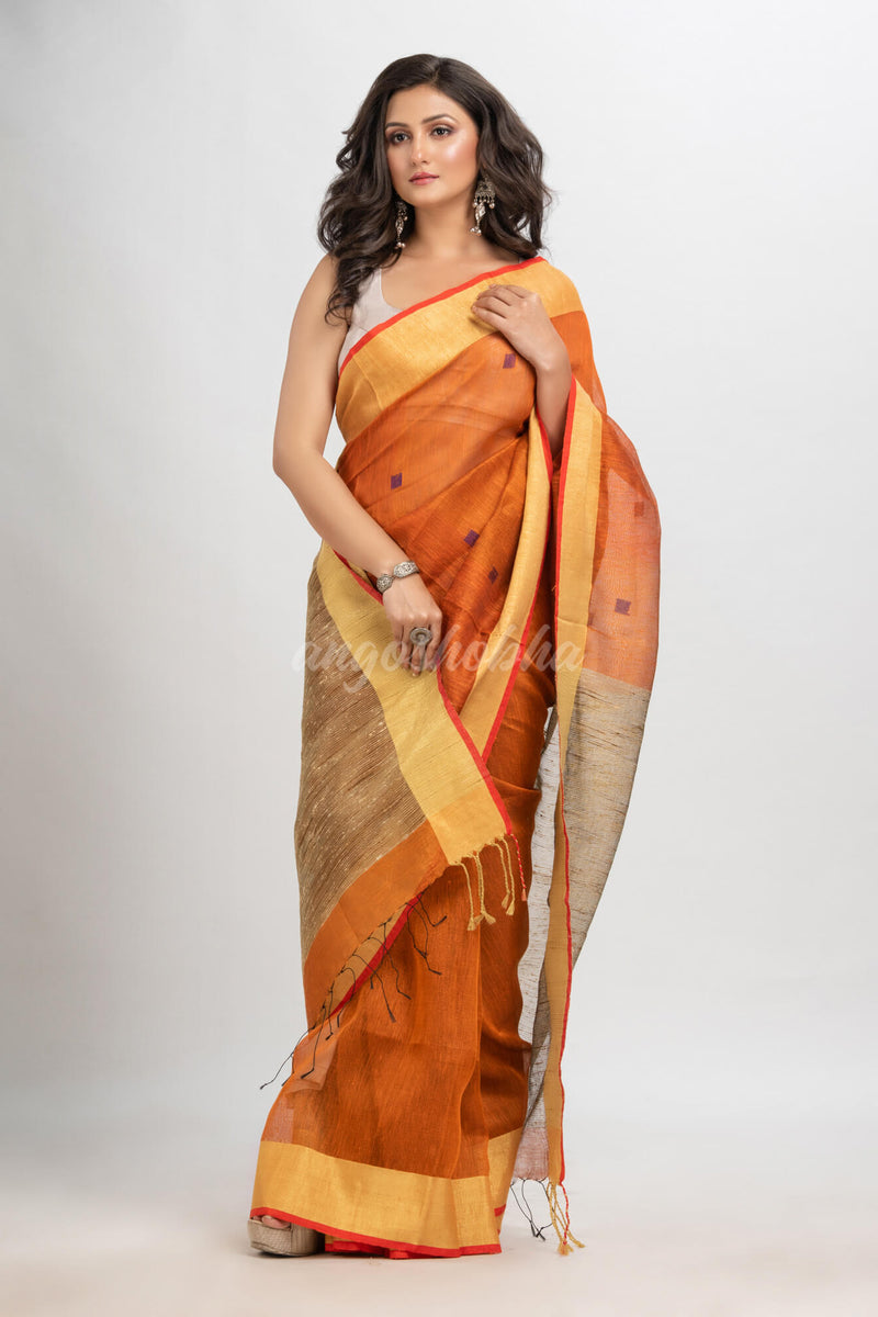 Russet silk blend linen with  solid border jamdani saree