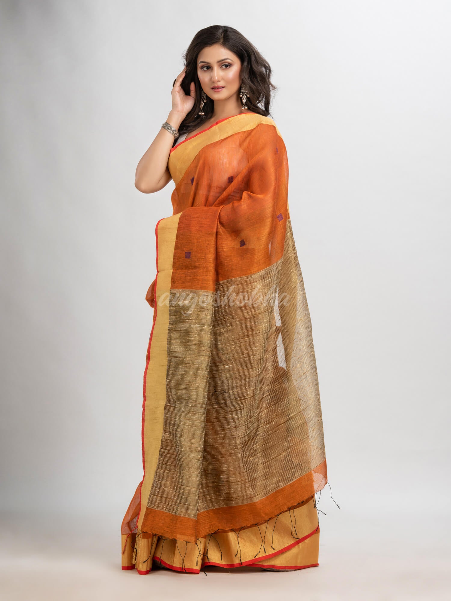 Russet silk blend linen with  solid border jamdani saree