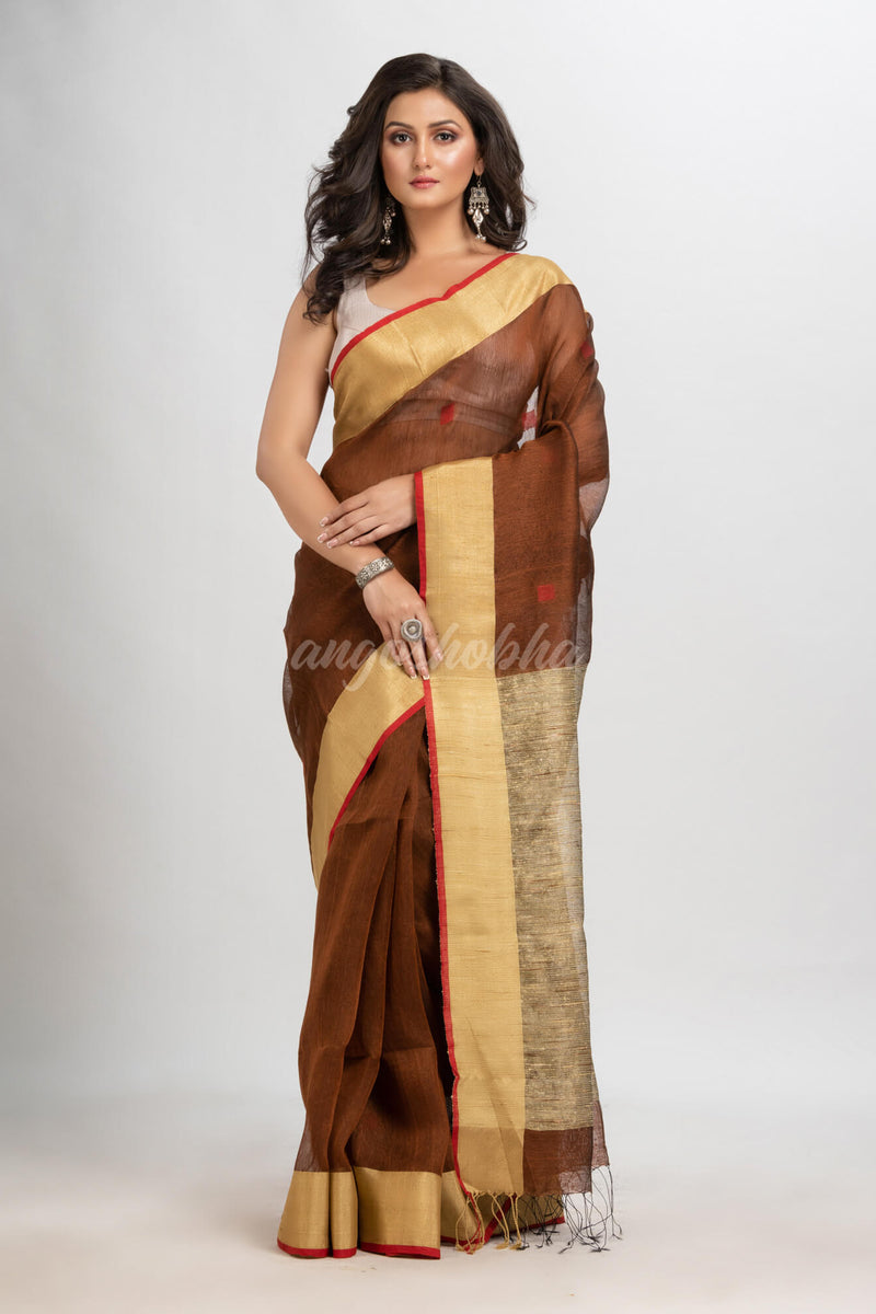 Dark coffee silk blend linen with  solid border jamdani saree