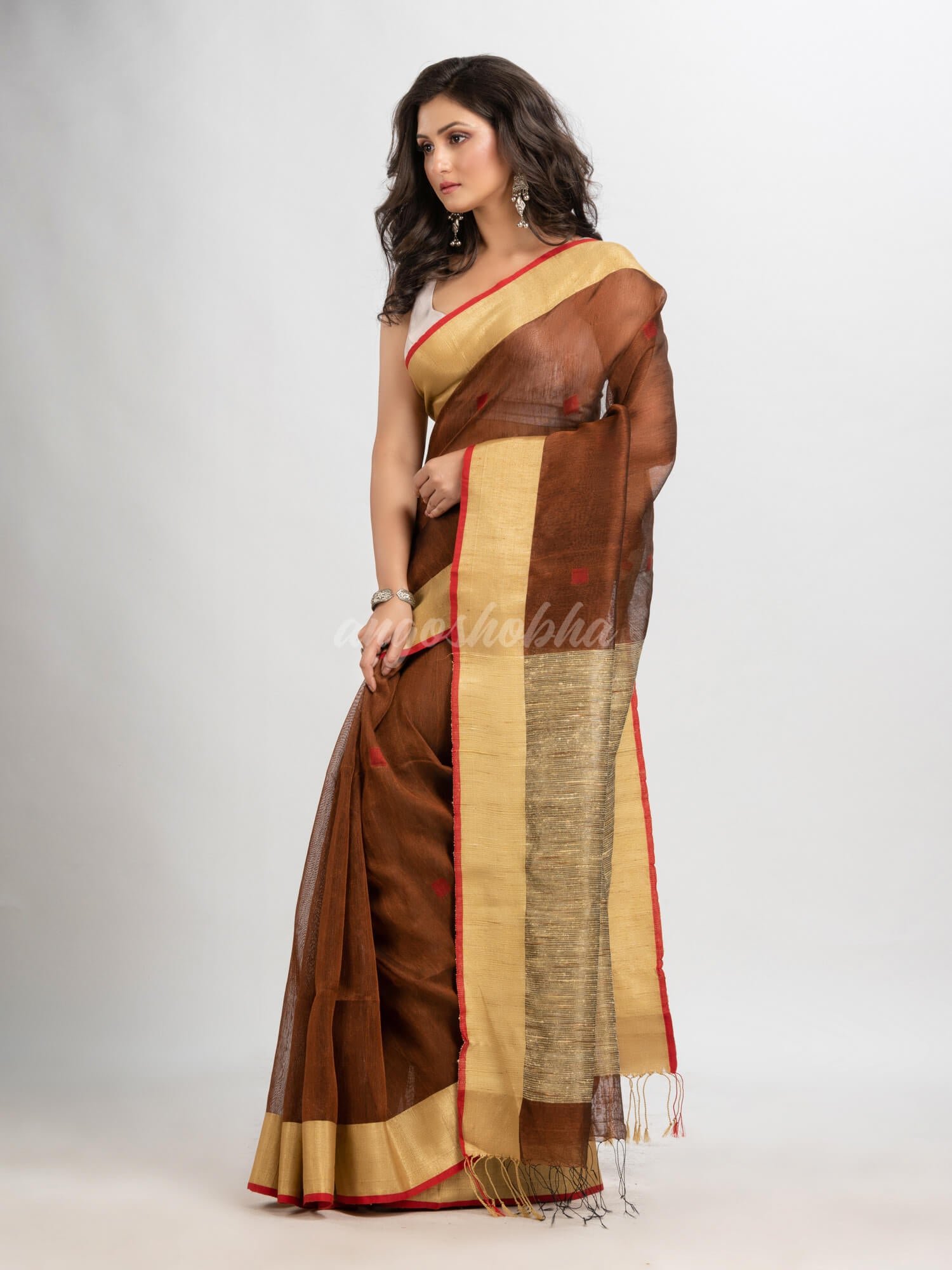 Dark coffee silk blend linen with  solid border jamdani saree