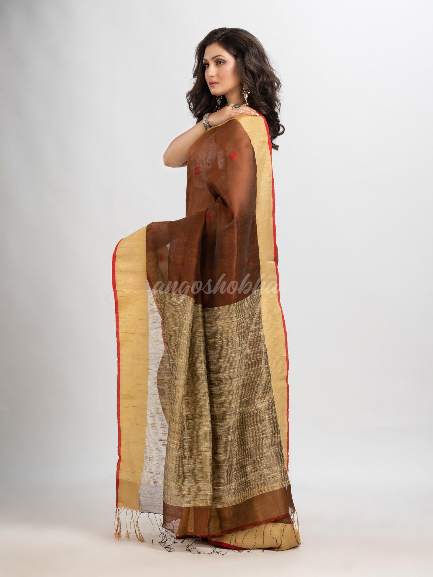 Dark coffee silk blend linen with  solid border jamdani saree