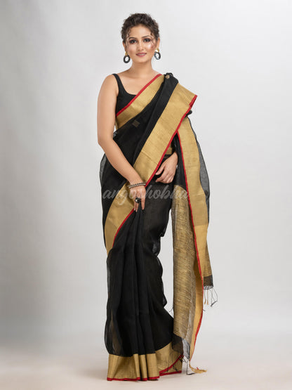 Black silk blend linen with  solid border jamdani saree