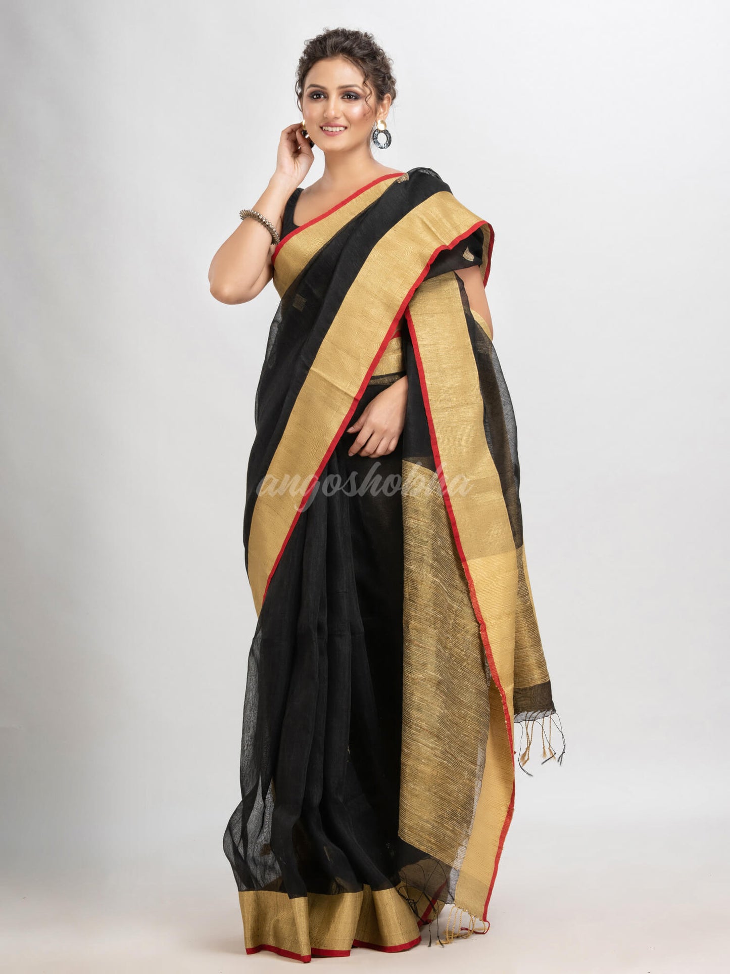 Black silk blend linen with  solid border jamdani saree