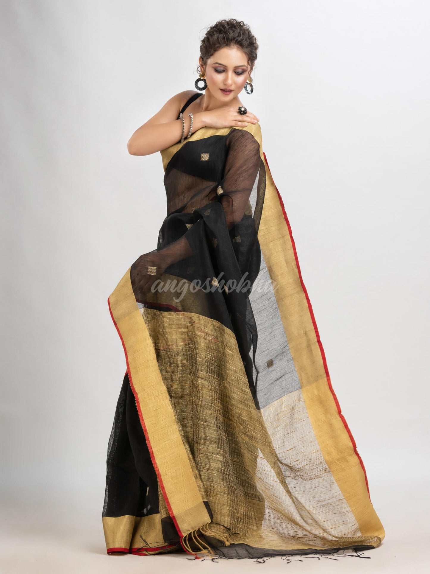 Black silk blend linen with  solid border jamdani saree